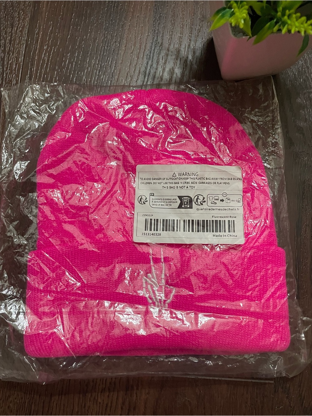 Neon pink knit beanie hat